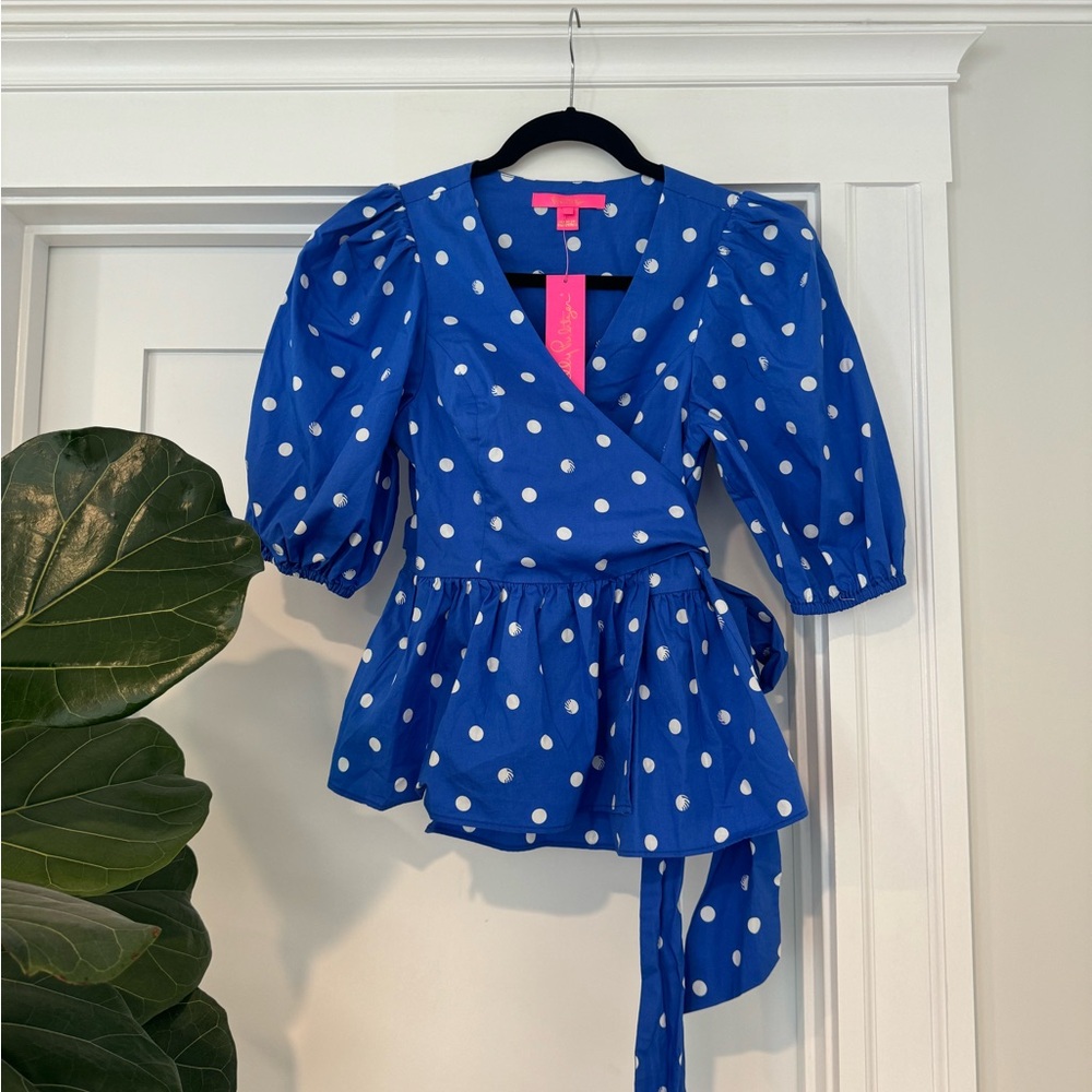 Lilly Pulitzer wrap top.  Bright blue with polka dots.